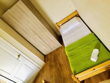 Фото номера Трехместный номер  Гостиница Guesthouse Lubimaya г. Кучугуры 4